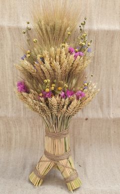 Straw decoration "Didukh Rizdvyanyy" medium with dried flowers